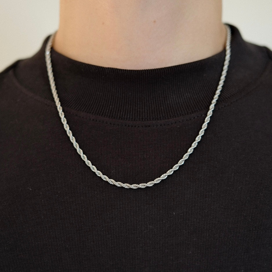 Upgrade your style with our men's stainless steel necklaces, available in Cuban, Figaro, and Rope chain styles. 